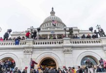 Crowd gathering outside the U.S. Capitol building.