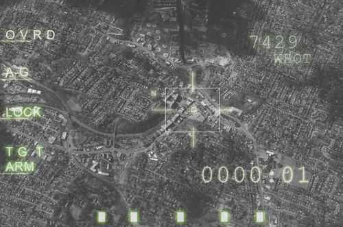 Aerial view through night vision targeting display.