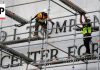 Crews prepare to remove Donald Trump's name from the Kennedy Center
