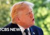 Trump trades stocks at unprecedented levels for a president, CBS News investigation finds