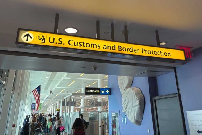 shutterstock_2669675179-2 Sign for U.S. Customs and Border Protection at an airport