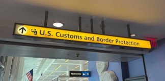 Foreign Elites Are Gaming America’s Citizenship Rules Sign for U.S. Customs and Border Protection at an airport