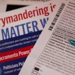 California Map Raises Fairness Questions Close-up of election materials including a ballot and informational flyers