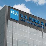 The Government Just Set a Powerful New AI Precedent FDA building with blue logo and sky background.