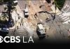 LADWP crews work to drain water after trunk line break causes severe flooding