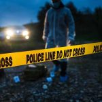 Irish Police Foil Major Border Car Bomb crime scene with yellow police line tape at night