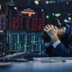Wiped Out: Hundreds of Billions From Musk’s Fortune Trader stressed out by multiple declining stock charts.