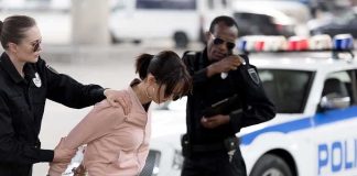 Viral Street: Videos Show Attacks on Women Police officers detain a woman beside a patrol car