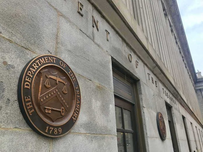 U.S. Treasury building exterior with bronze seal on stone wall