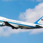 Iran “Decimated”? America “Won”? Air Force One aircraft ascending against a blue sky
