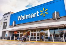 Walmart store exterior with shoppers and carts