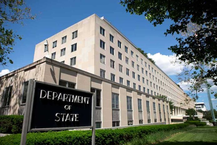 shutterstock_196805378-1 Department of State building exterior on a sunny day