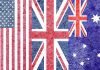 Composite of the US, UK, and Australian flags with a textured, grunge overlay