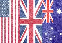 Composite of the US, UK, and Australian flags with a textured, grunge overlay