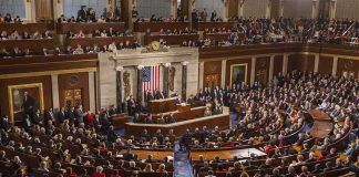 Circumcision Comment Ignites Heated Medical Debate Legislative chamber filled with attendees during a formal address