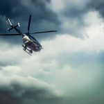 Police Chopper Hit — What Went Wrong? Police helicopter flying under dark storm clouds