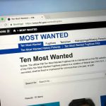 FBI Explores Predictive AI for Terrorism Watchlist Screening Computer screen showing an FBI Most Wanted webpage