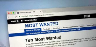 FBI Explores Predictive AI for Terrorism Watchlist Screening Computer screen showing an FBI Most Wanted webpage