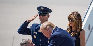 Trump Cuts Camp David Stay Short Donald Trump greets Greg Abbott as Melania Trump and Daryl Harper look on at an airport