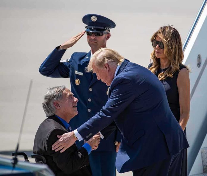 Donald Trump greets Greg Abbott as Melania Trump and Daryl Harper look on at an airport