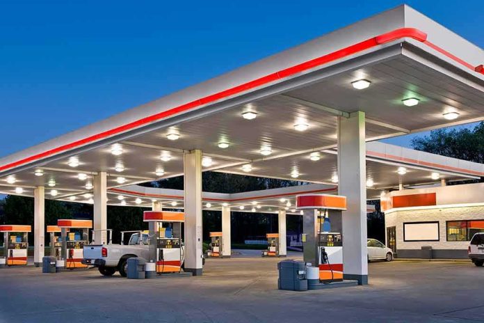 gas station canopy with multiple fuel pumps at dusk