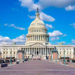 Government Power Grab Becomes Major Threat United States Capitol building under a bright blue sky