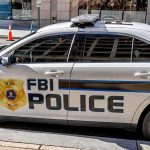 FBI Sting Targets Army Insider Network FBI Police patrol car parked on city street