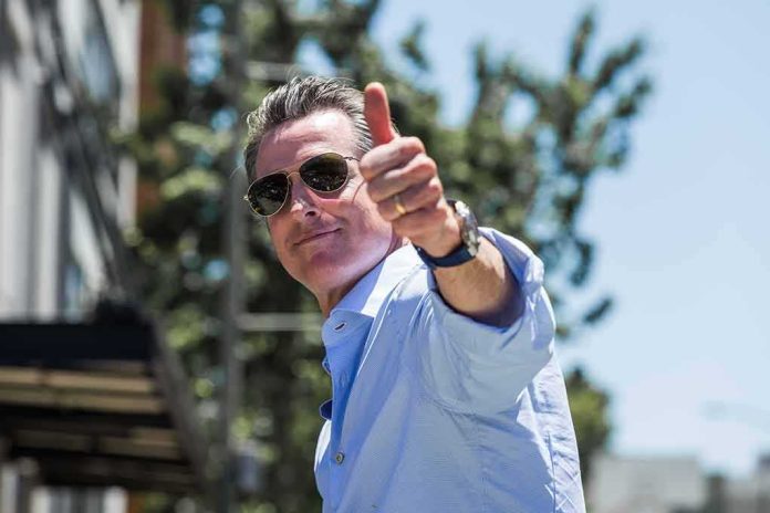 man in sunglasses giving a thumbs-up outdoors