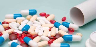 Nine-Year Addiction: 40 Codeine Pills at Once Assorted pills and capsules spilled from a bottle