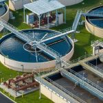 New River Sites Come With Sewage Warnings! Wastewater treatment plant with circular clarifiers and aeration tanks