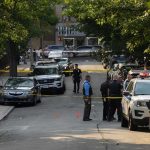 Young Egyptians Face Terror Charges Over Alleged Discord Activity Police officers secure a residential street with patrol cars and yellow tape