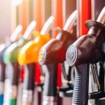 Drone Attack Hits Key Saudi Pipeline Close-up of fuel pump nozzles at a gas station