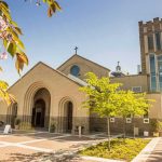 Underground Church Leaders Arrested in Nationwide Raids Across China Brick church with arched entrance and tall bell tower on a sunny day