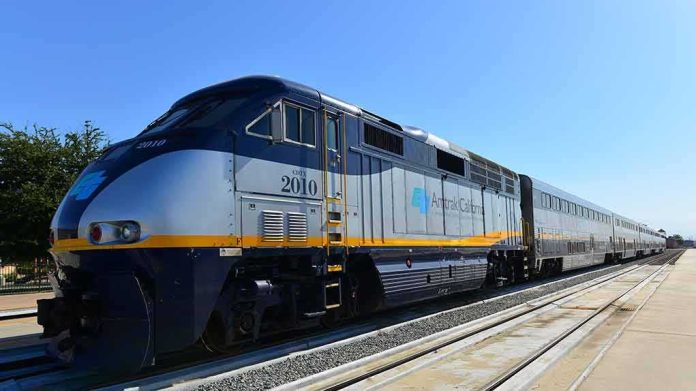 shutterstock_302916500 Amtrak California passenger train at a station platform
