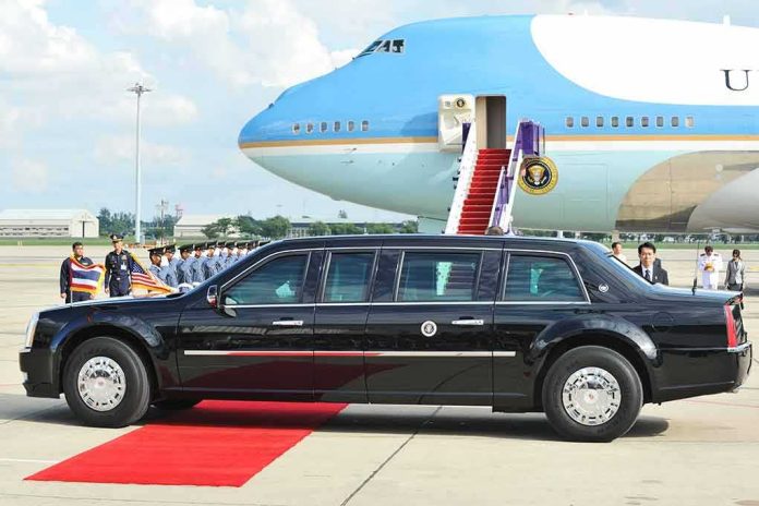 shutterstock_315613541 Presidential limousine beside a large blue-and-white jet on a runway