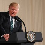Trump Calls for Fauci Prosecution After Senate Contempt Vote Donald Trump speaking at a podium with presidential seal