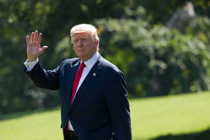 man in suit waving outdoors