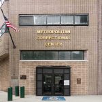 Metropolitan Correctional Center entrance with American flag
