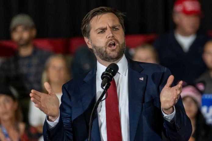 54801cb8-0515-4c34-a2d8-f79705e6683e_shutterstock2542628059jpg.jpeg Man in suit speaking at a podium