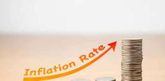 Inflation Hits 3.7% as Gas Prices Surge stacks of coins increasing with upward arrow