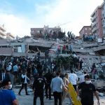 Powerful Quakes Shake Panama Rescue workers and civilians on collapsed building after earthquake
