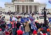Barbara Bellenberg and Chuck Howley amid a large crowd outside the U.S. Capitol
