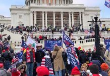 Barbara Bellenberg and Chuck Howley amid a large crowd outside the U.S. Capitol