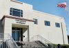 FBI office building with entrance steps and American flag