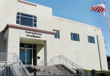 FBI office building with entrance steps and American flag