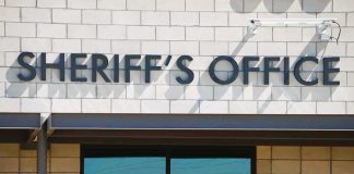 Texas Mother Charged After Sons Are Killed sheriff's office building exterior sign