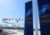 NATO flags and banners outside headquarters