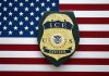 ICE officer badge on American flag background