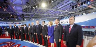 Michigan Senate Race Turns Heated Chris Christie stands at right as Carly Fiorina, Jeb Bush, Ben Carson, and John Kasich line up on a debate stage