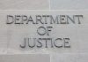Department of Justice inscription on stone wall